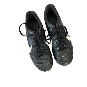 Nike black and white cleats size 2.5